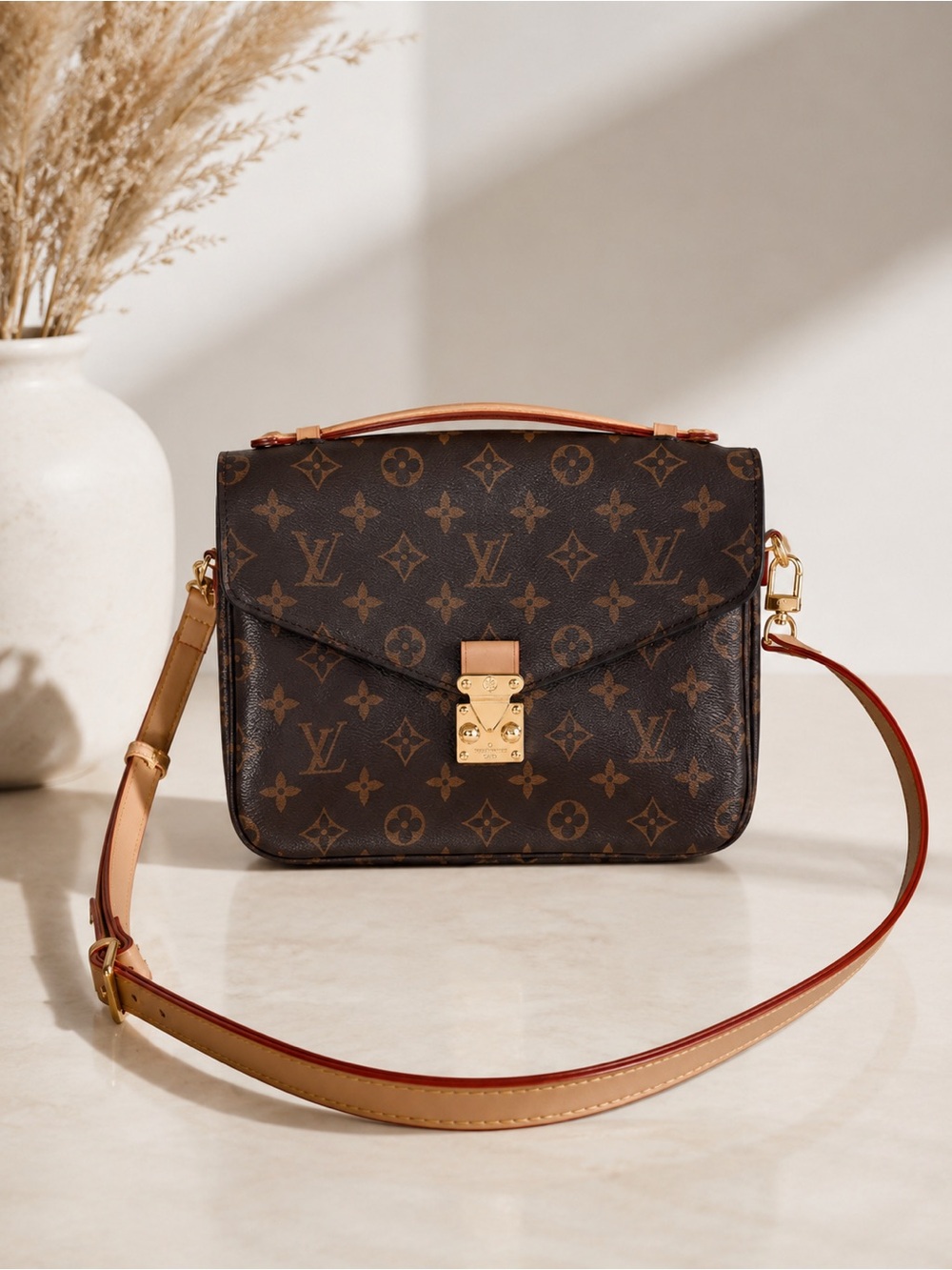 Louis Vuitton Monogram pochette metis Crossbody in Brown and Tan